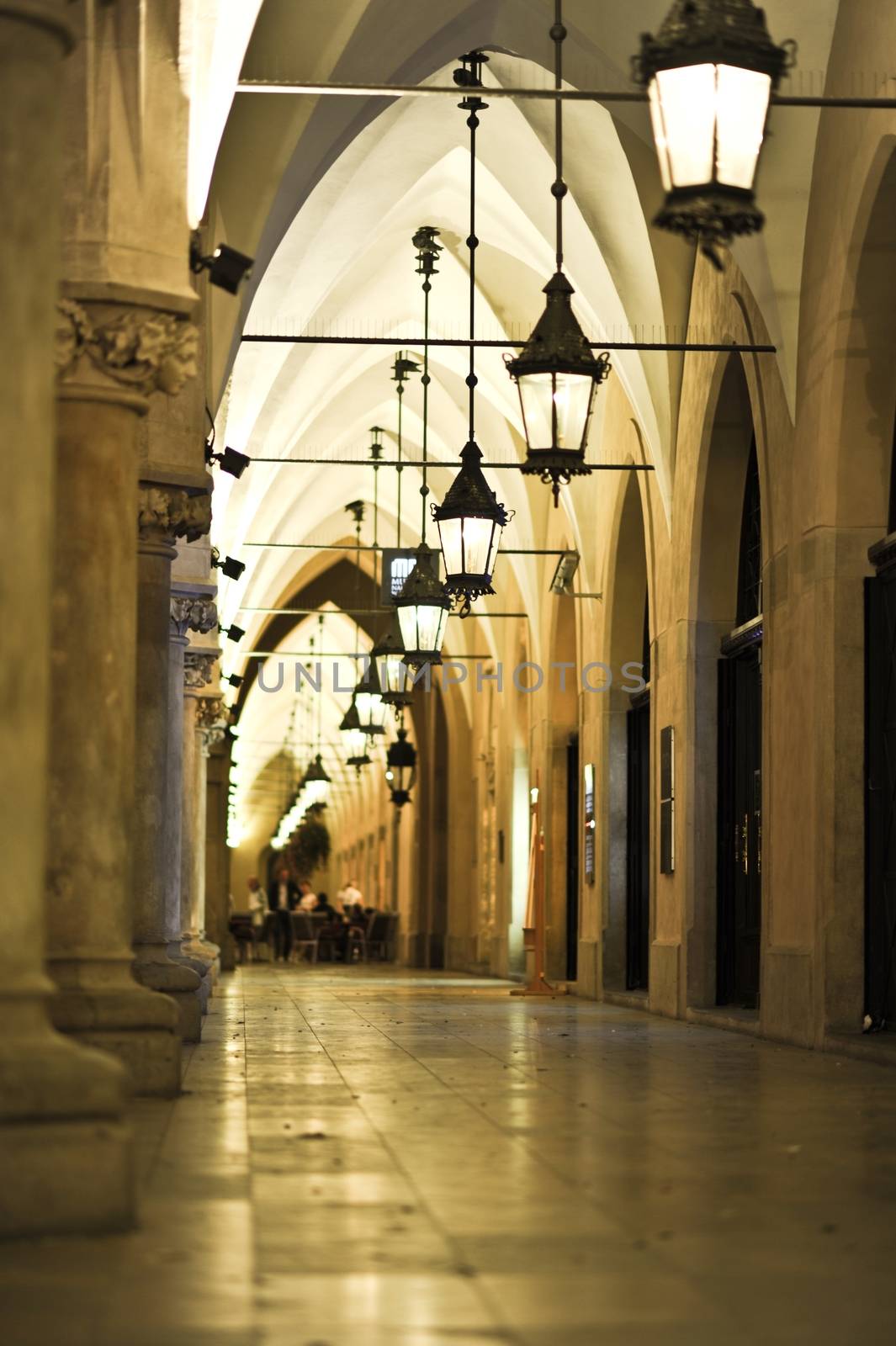 Cracow, Poland: Sukiennice. Cracow Market Square Historical Building. The Renaissance Sukiennice in Kraków, Poland, (Europe) is One of the City Most Recognizable Icons. Sukiennice at Night. Vertical Photo