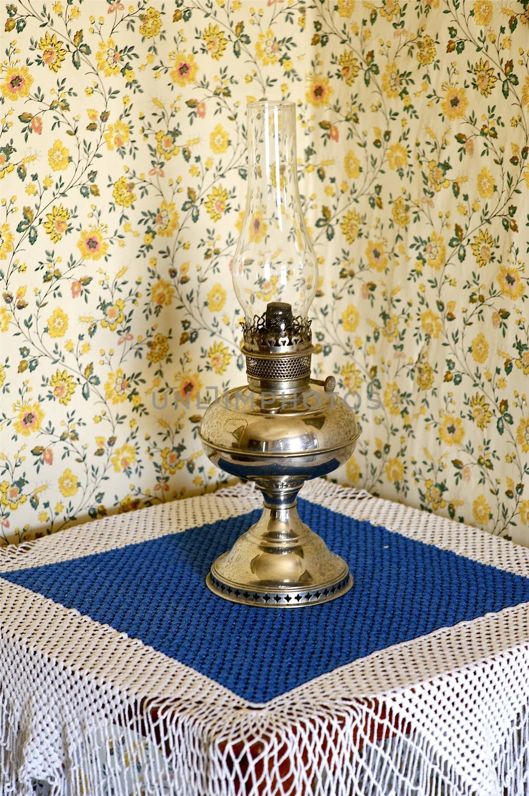 Vintage Oil Lamp on the Vintage Home Interior Table. Vintage Oil Lamp Lighting.