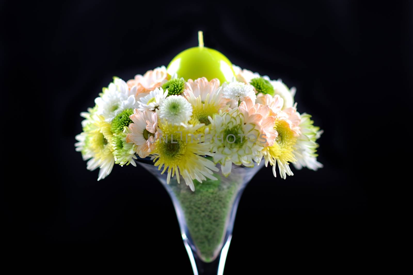 Flowers Bouquet with Green Candle. Part of Wedding Tables Decoration. Horizontal Studio Photo.