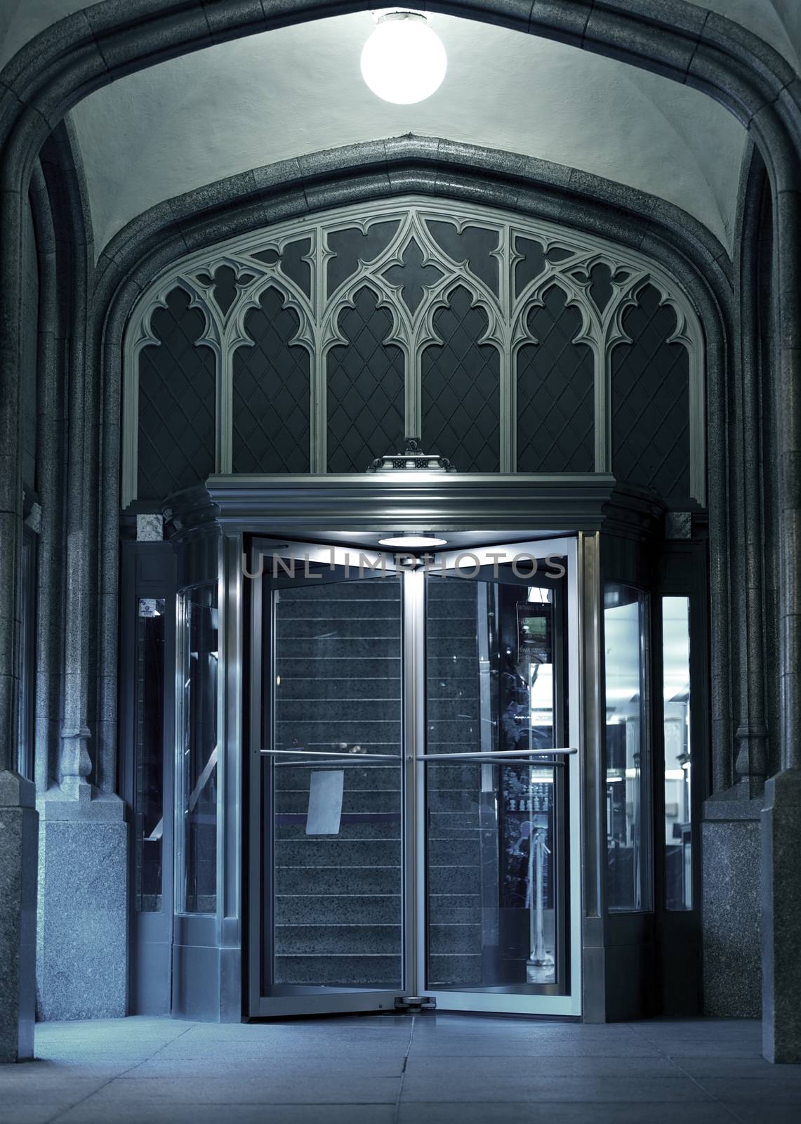 The Entrance - Chicago Architecture. Entrance with Glass Rotating Door. The Entrance - Vertical Photography.