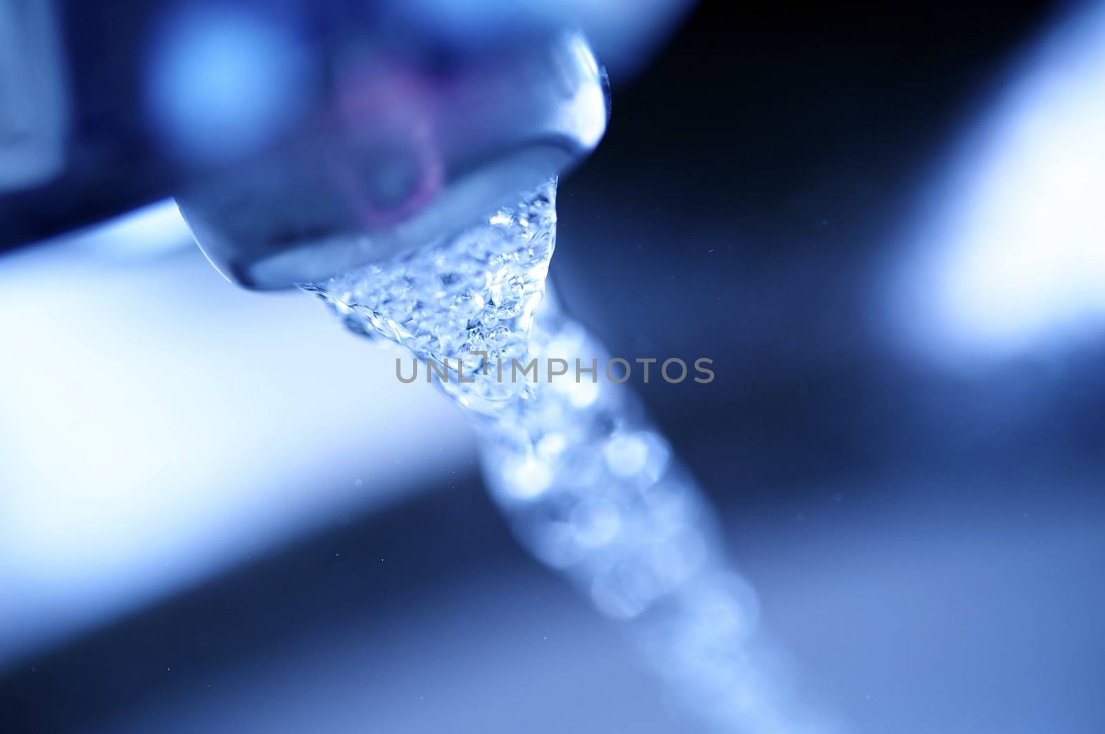Fresh Water Closeup. Running Water from Silver Fosset.