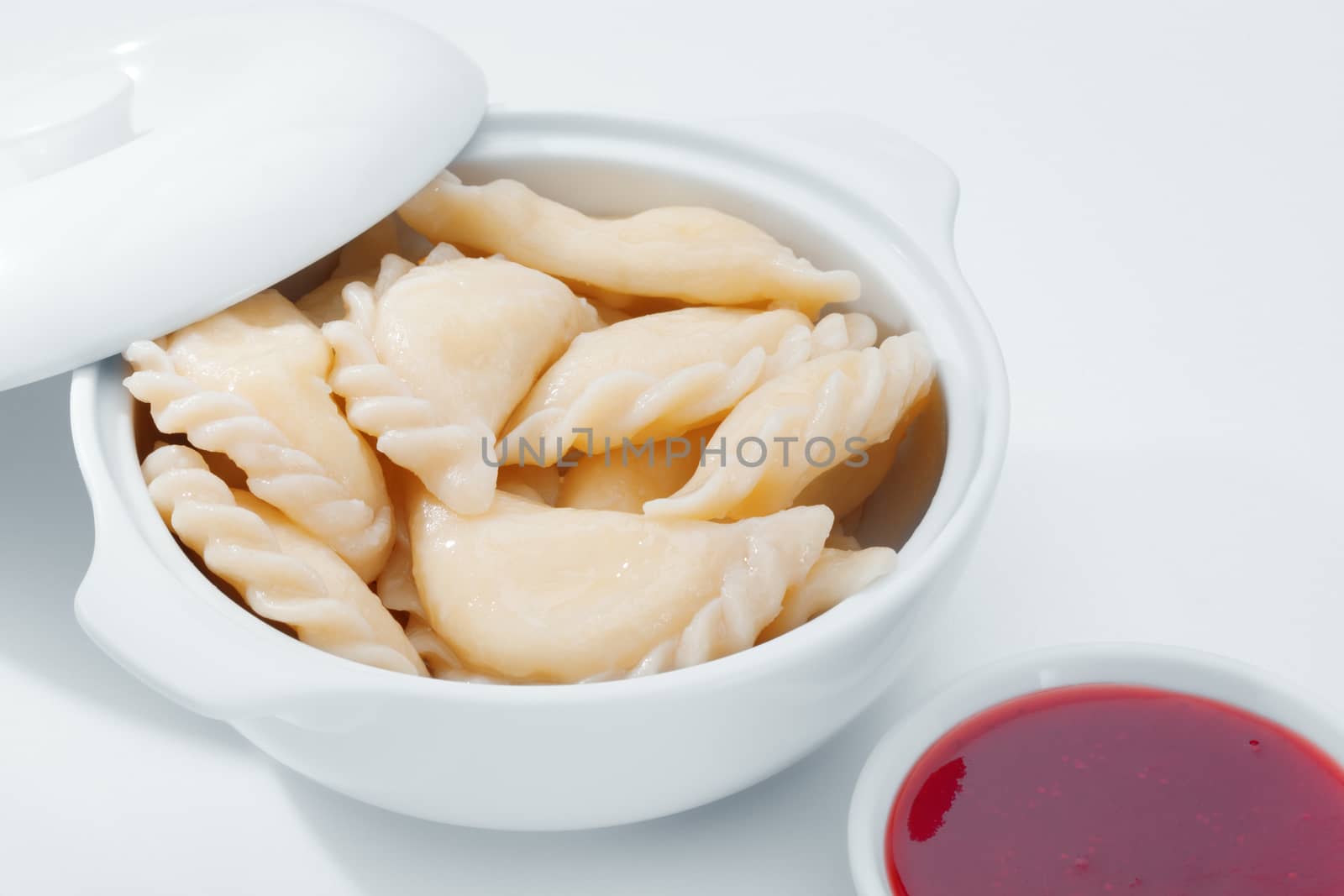 close up view of nice delicious ravioli on white back