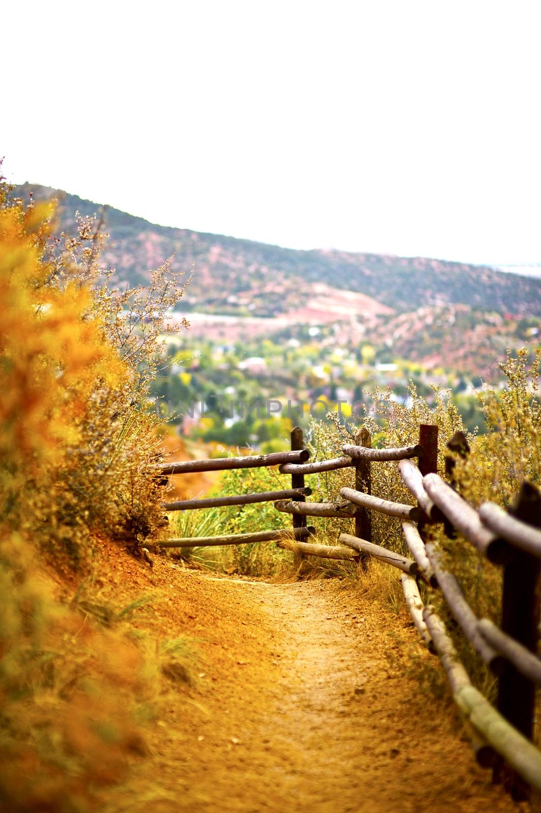 Fall Trail in Colorado Rocky Mountains. Trail near Manitou Springs, Colorado. Wood Fence.