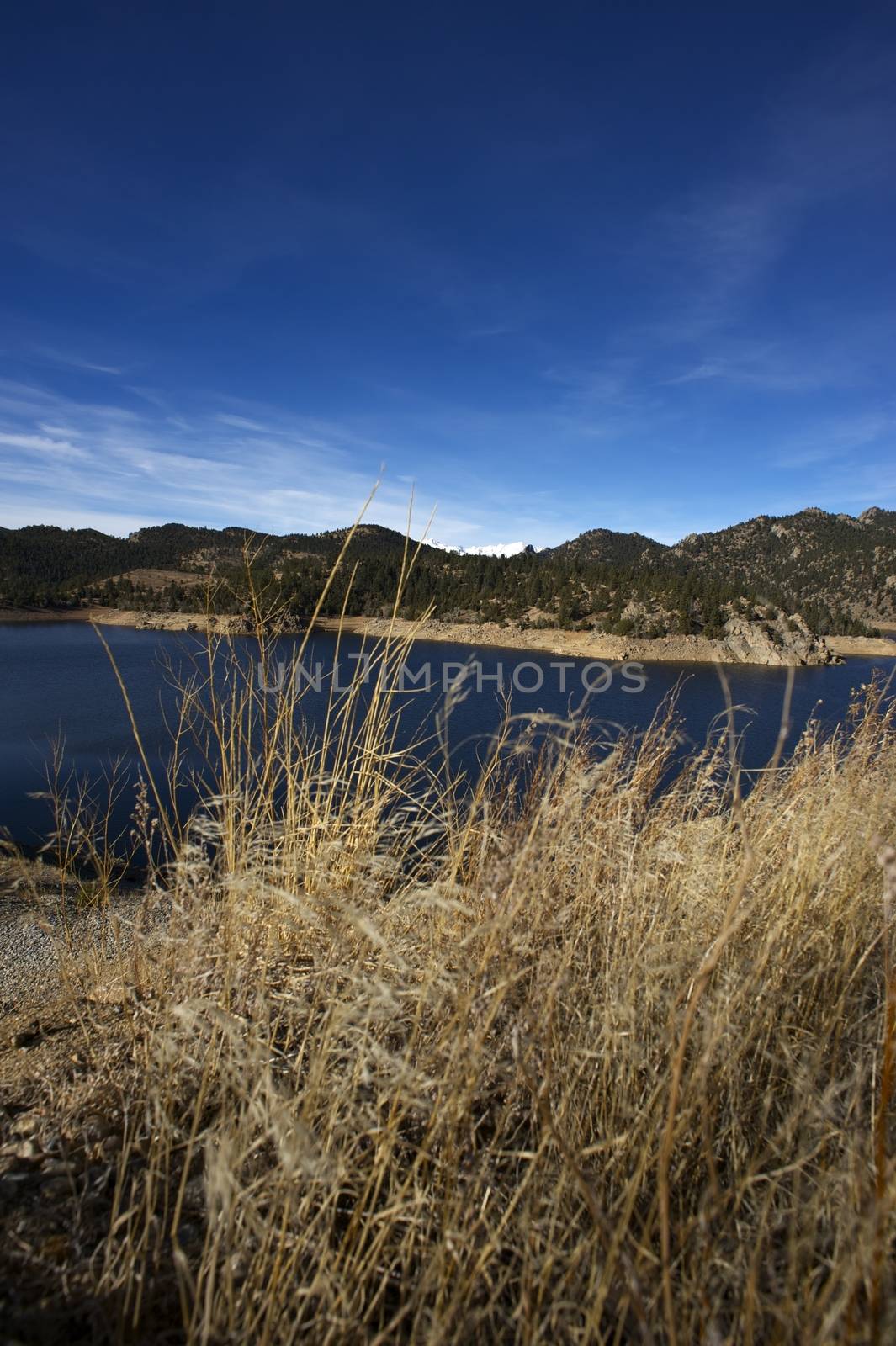 Dry Colorado Grasslands and Water Reservoir  - Late Fall in Colorado. Gross Reservoir.