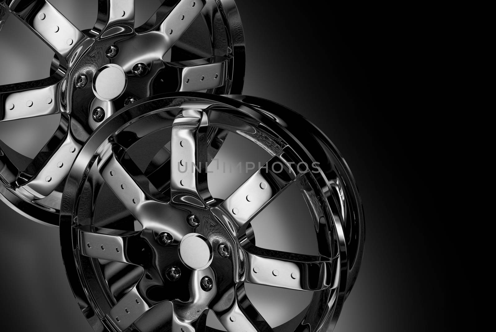 Two Chrome Wheels - Shiny Chromed Alloy Wheels on Dark-Black Background. 
