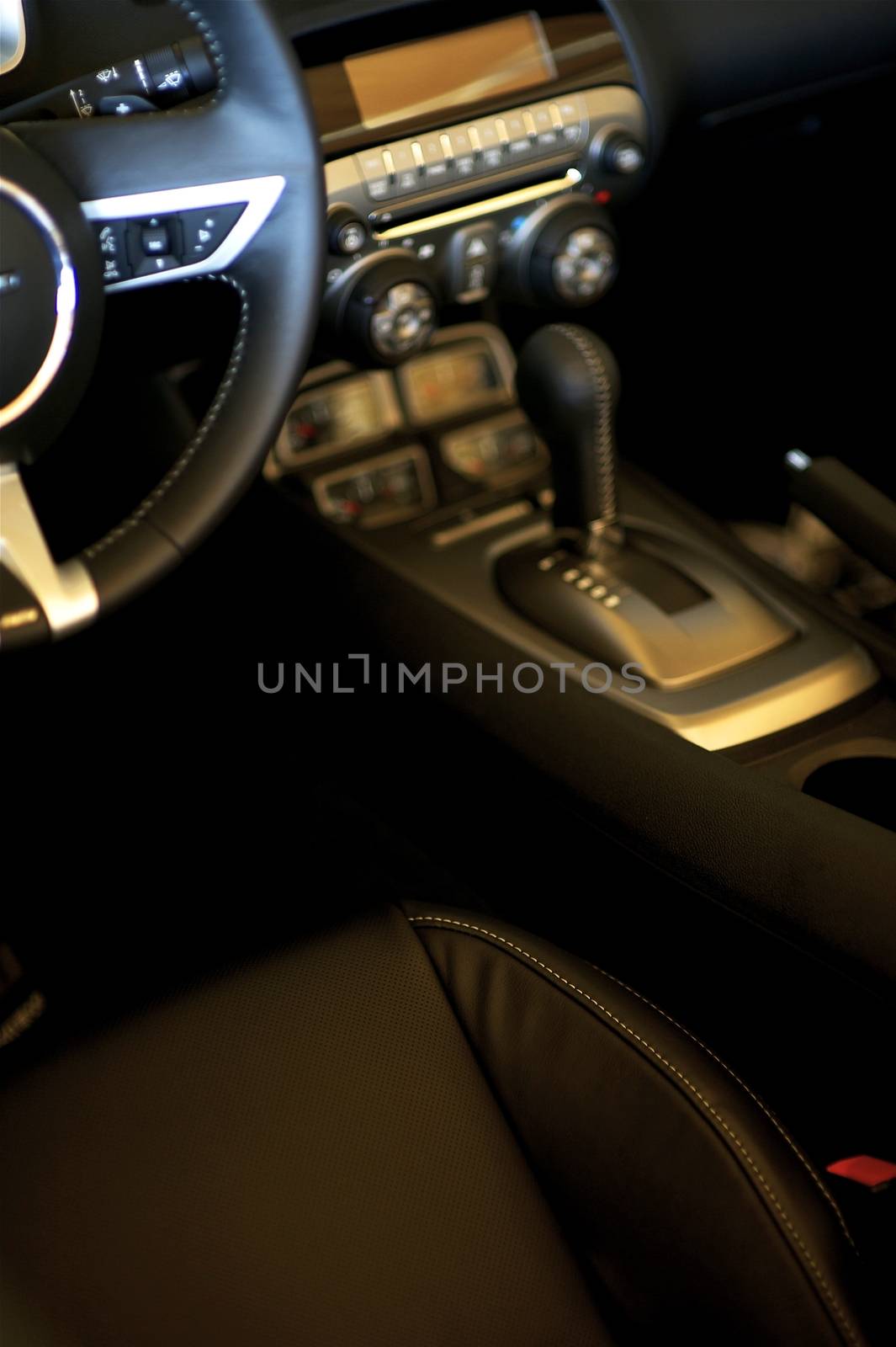 Sporty Car Interior. Dark Leather Interior. Transportation Photo Collection.