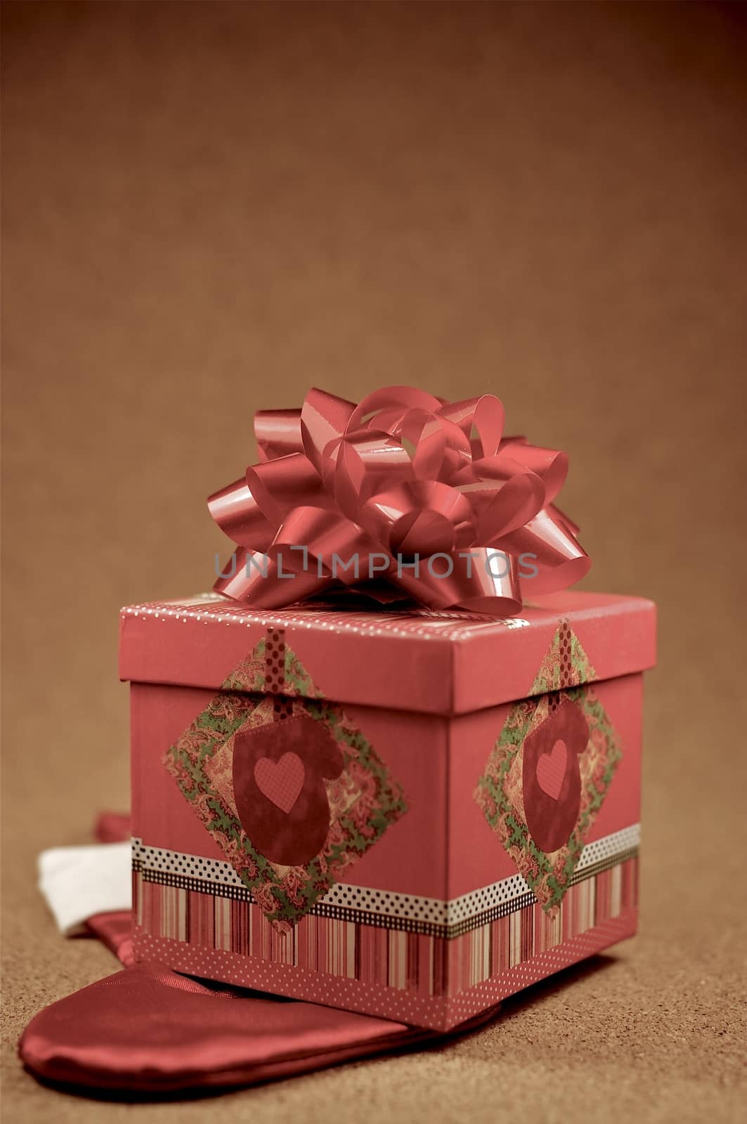 Small Christmas Gift - Decorative Gift Box with Red Bow on the Top. Christmas Theme