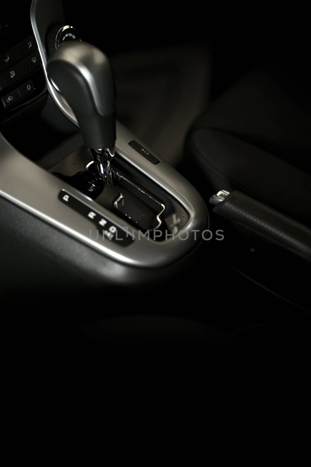 Automatic Drive. Automatic Transmission Console and Dashboard of the Modern Car. Dark Studio Photo