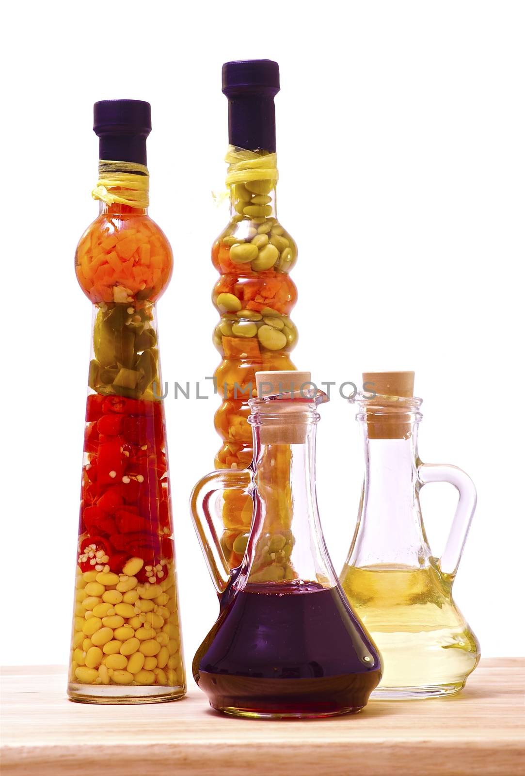 Kitchen Supplies. Marinated Vegetables and Oil. Clipped Photo - Solid White Background