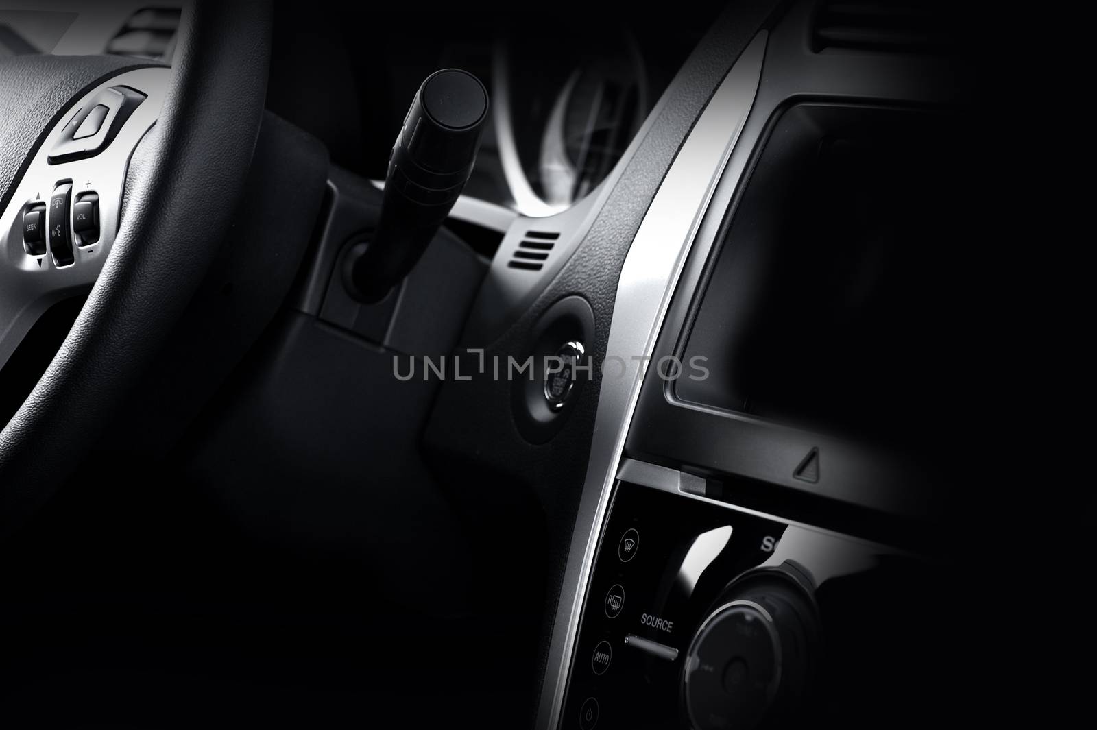 Modern Vehicle Dash and Steering Wheel. Dark Vehicle Interior. Modern Design.