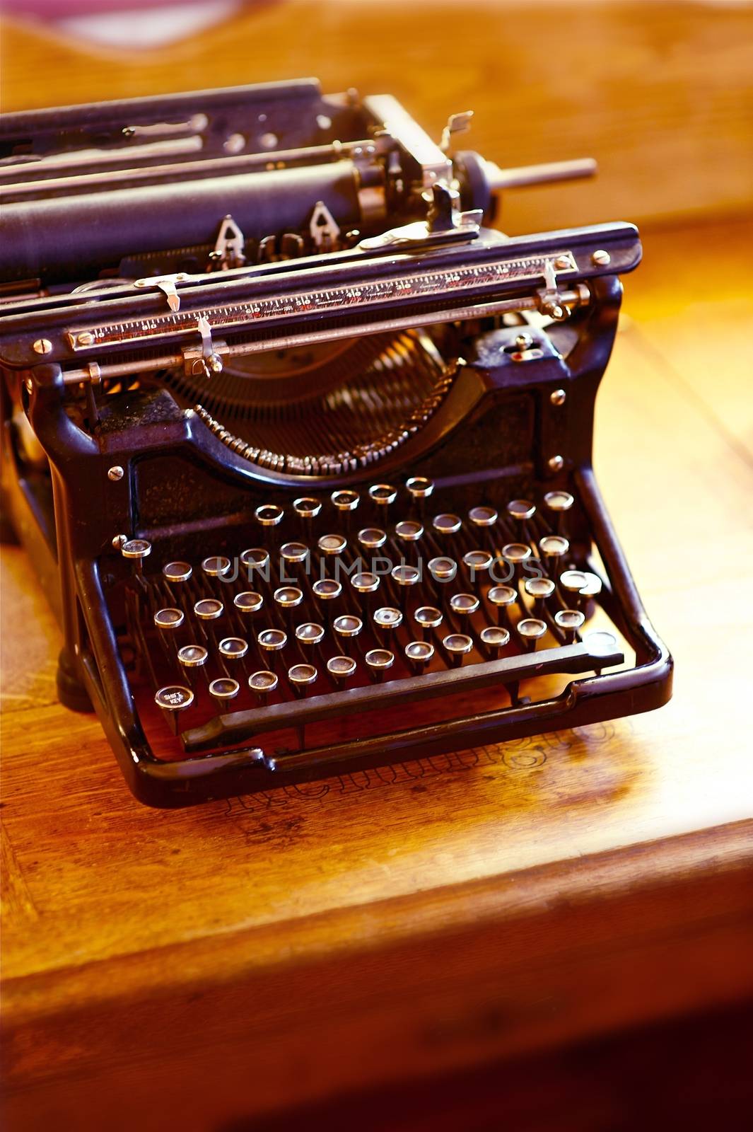 Vintage Typewriter in Dust. Desktop Vintage Typewriter Vertical Photography.