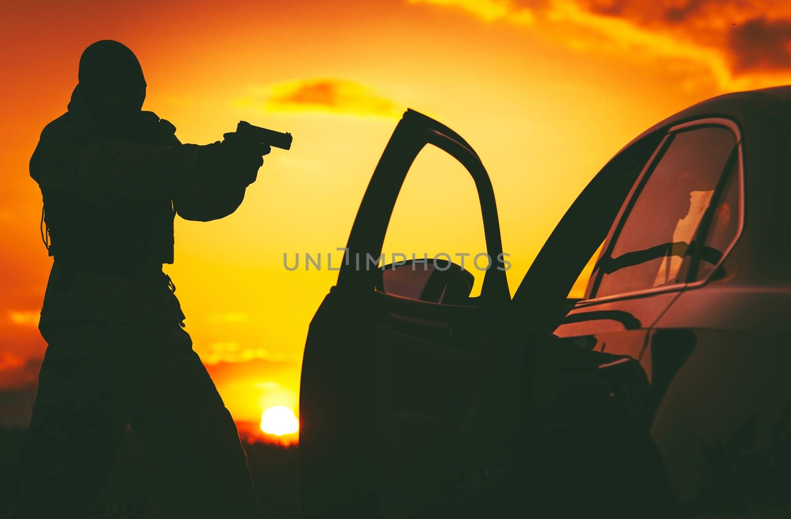 Counter Terrorism Check Point. Hunt For Terrorists. SWAT member in a Mask Pointing His Gun on Terrorist Member Inside Stopped Vehicle. 