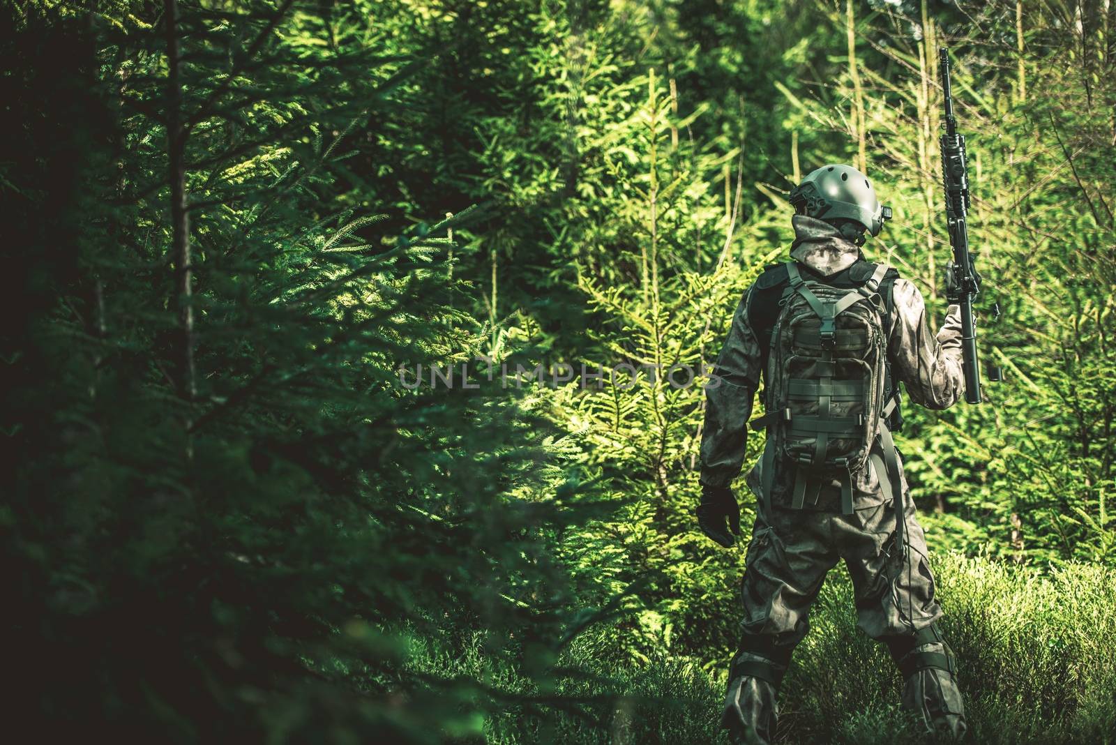 Soldier Mission in the Forest. Army Concept Photo.