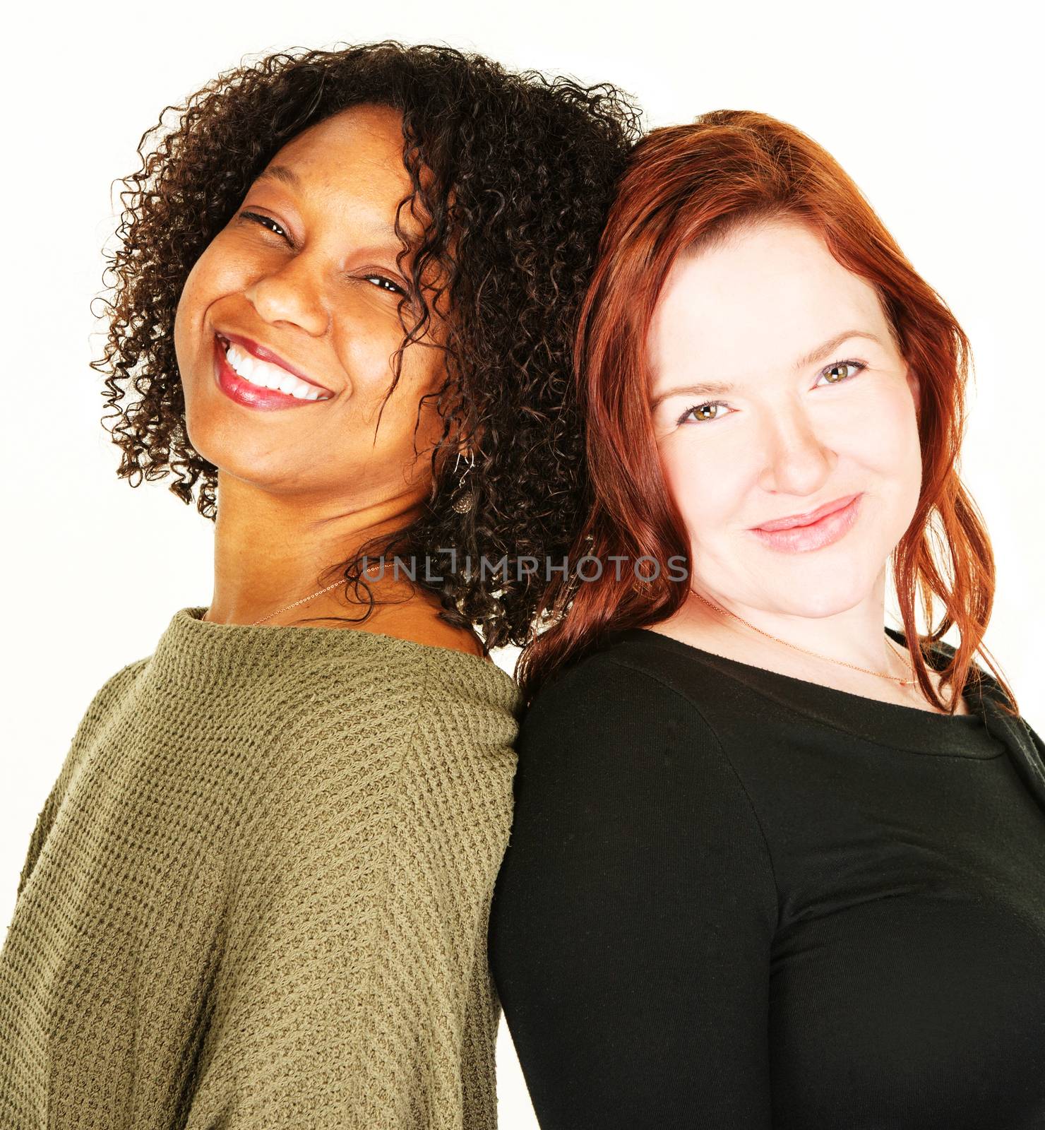 Two attractive adult female friends over white background