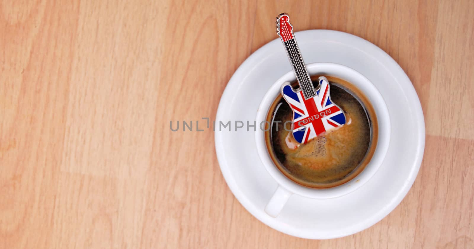 image of guitar souvenir from london in espresso cup