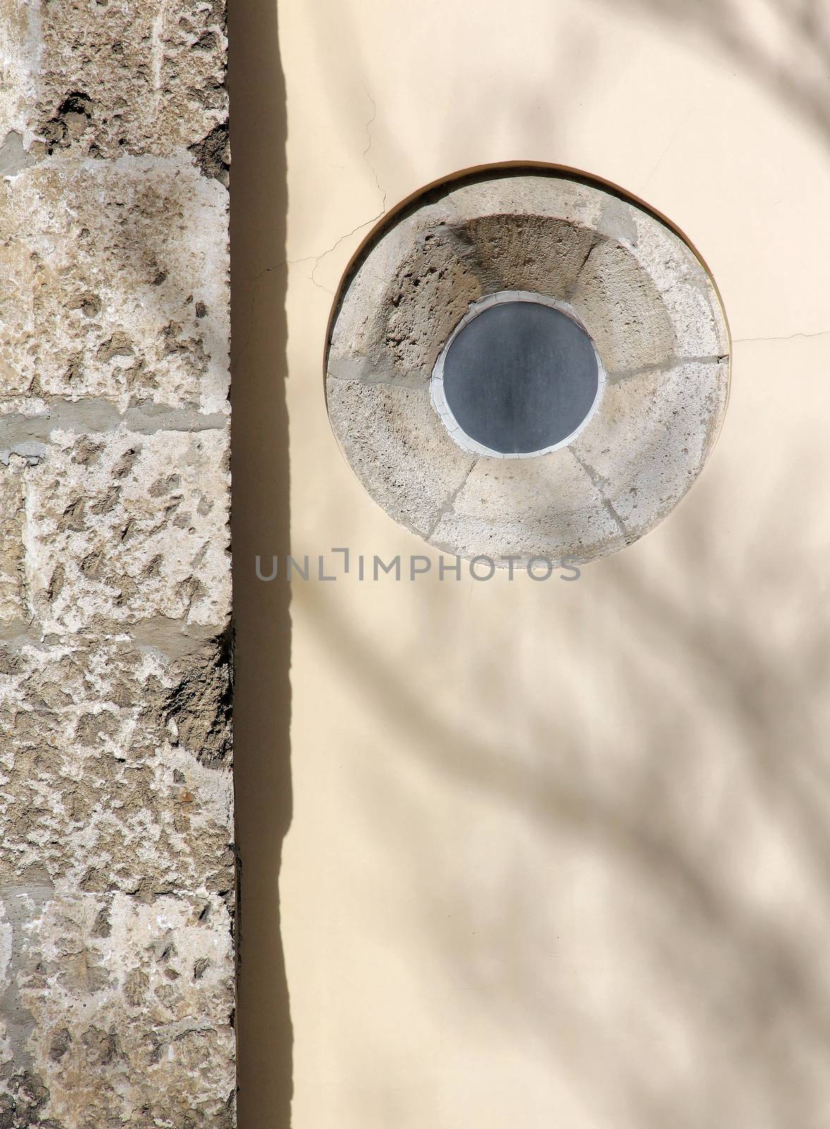 Circular church window stone wall background.