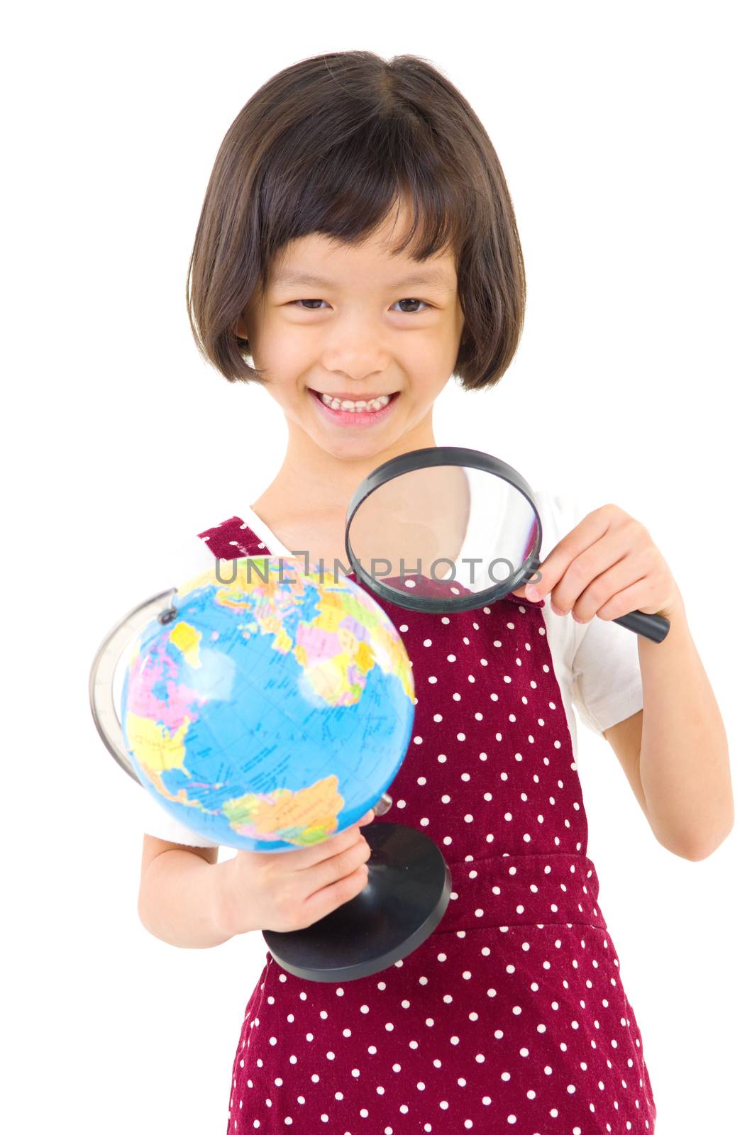 Asian little girl looking at the globe