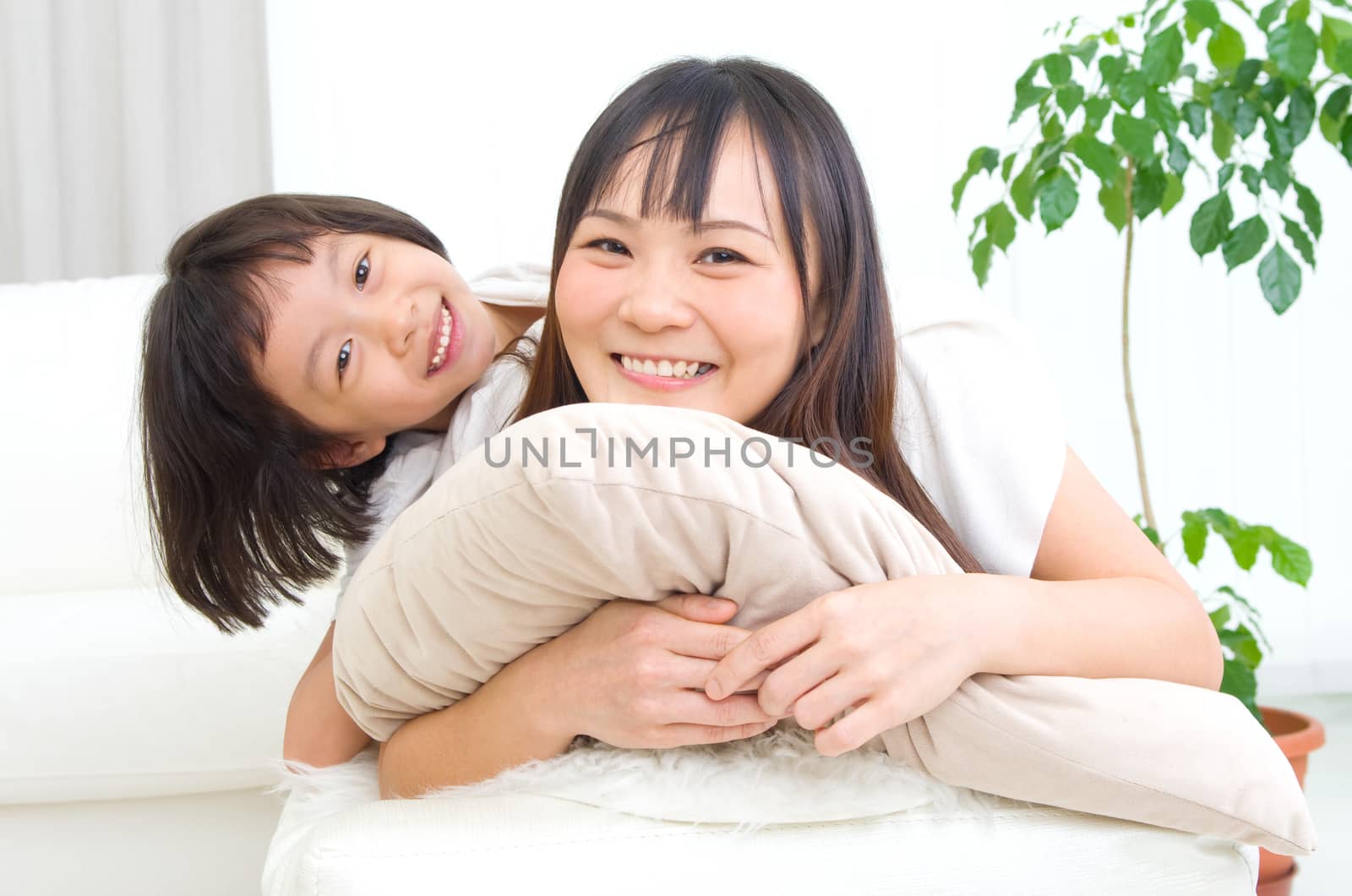 Indoor portrait of asian family