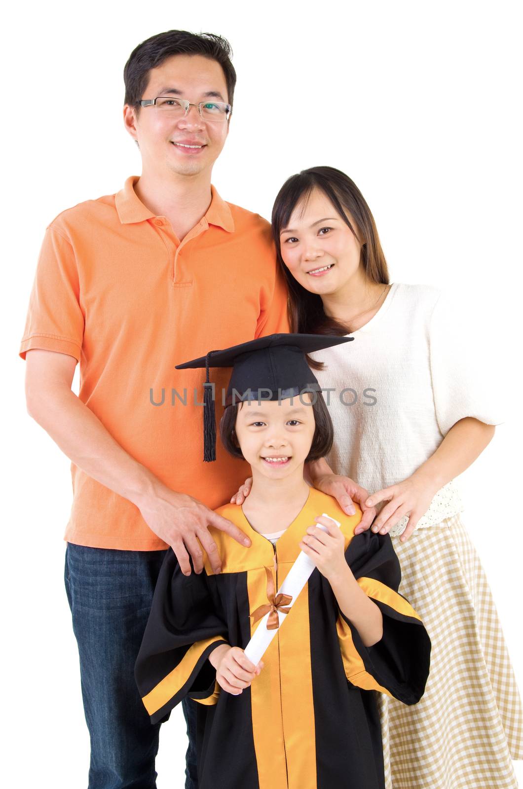 Asian kid in graduation gown.Taking photo with family.