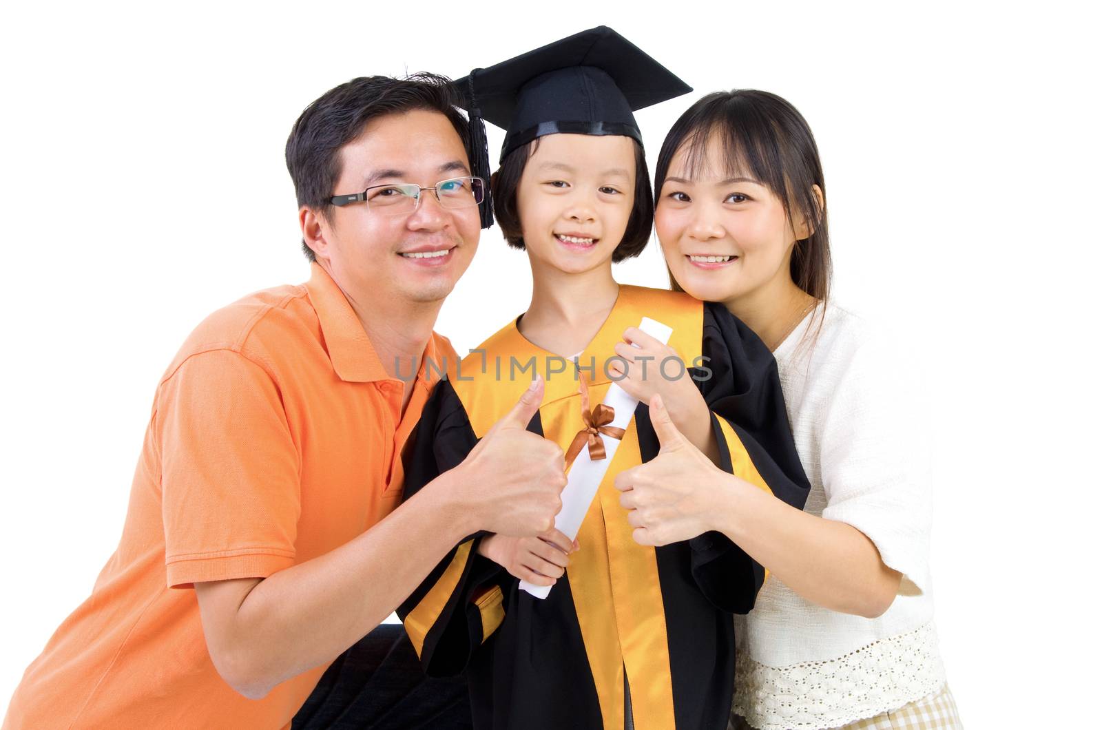 Asian kid in graduation gown.Taking photo with family.