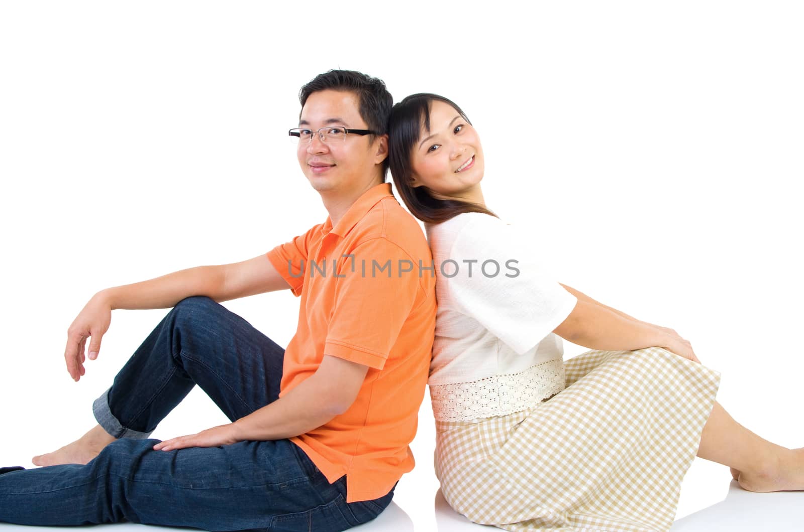 Happy Asian couple in love. Asian couple smiling isolated on white background.