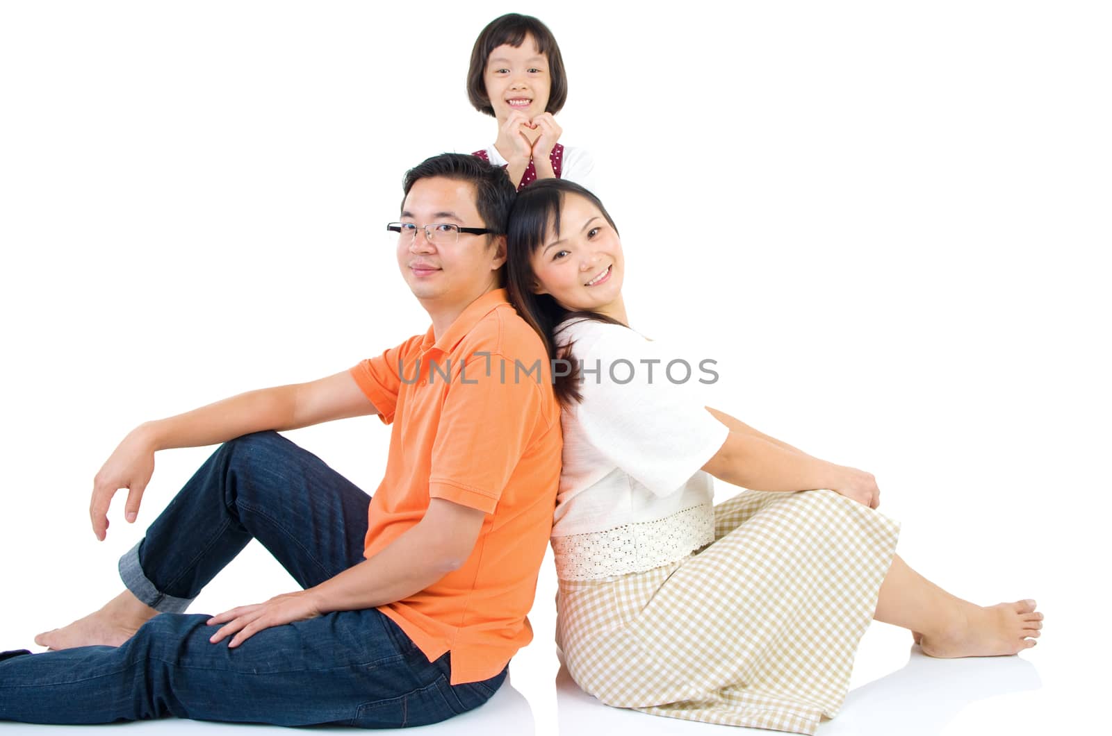 Indoor portrait of beautiful asian family