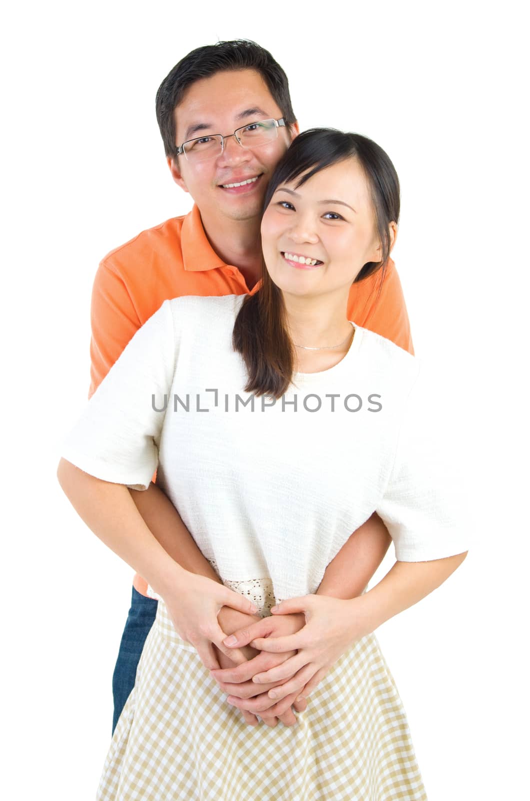 Happy Asian couple in love. Asian couple smiling isolated on white background.