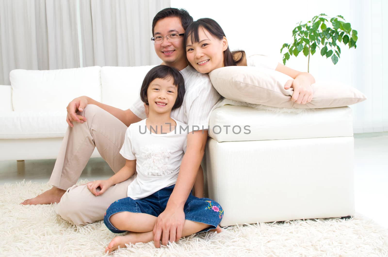 Indoor portrait of asian family