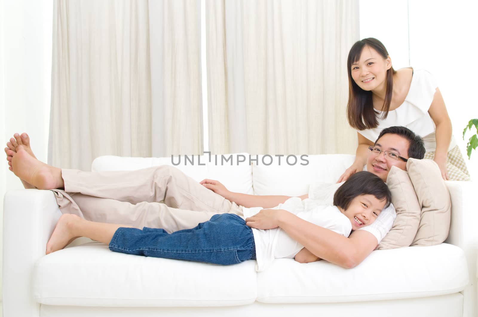 Indoor portrait of asian family