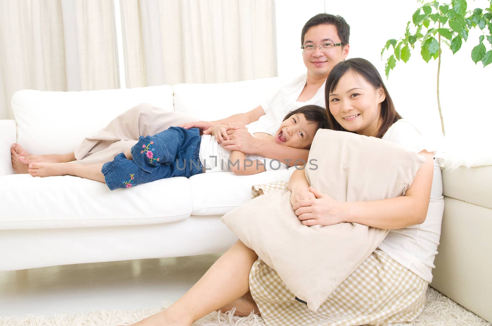 Indoor portrait of asian family