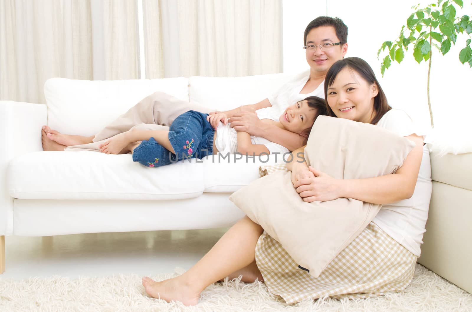 Indoor portrait of asian family