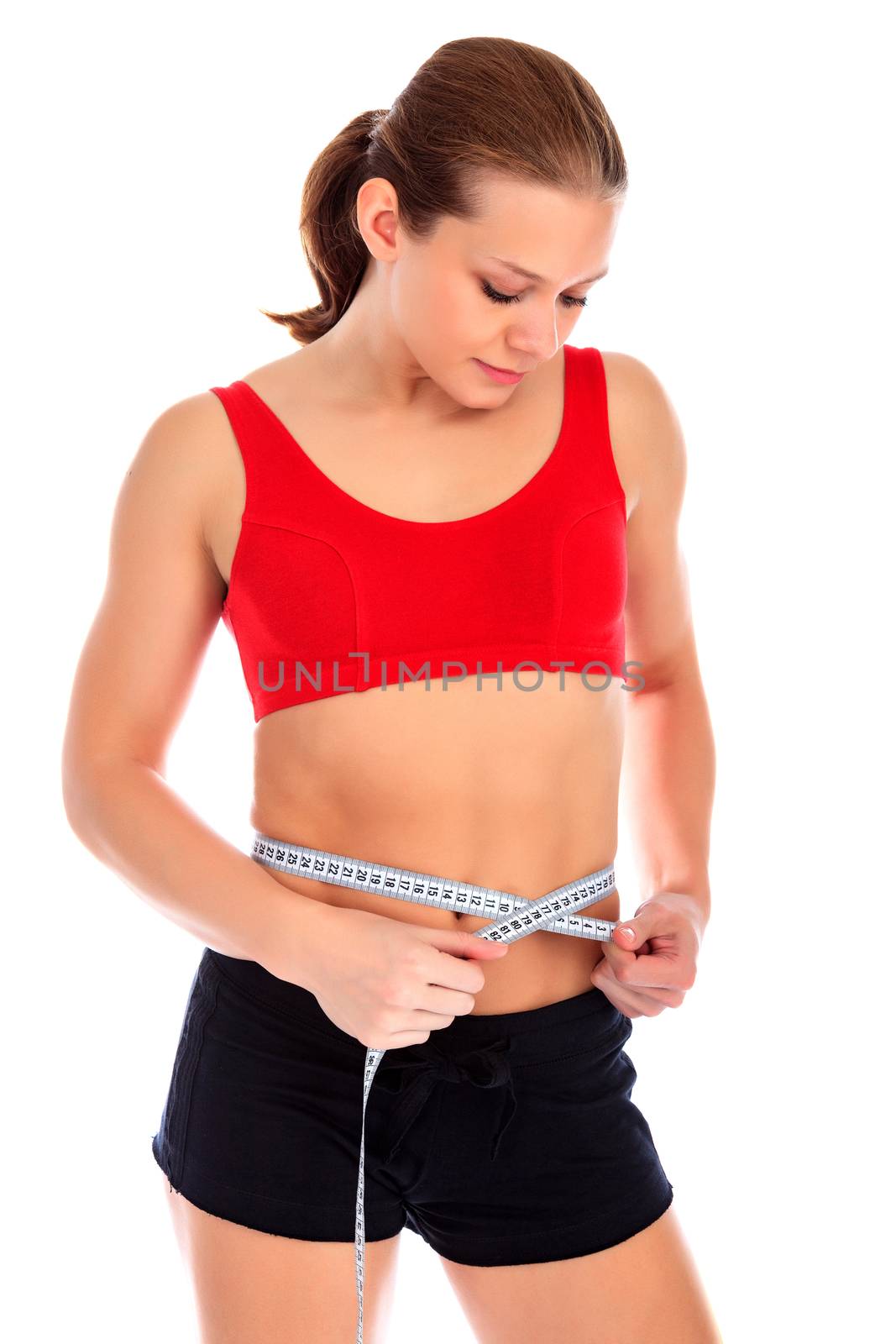 Fitness woman posing against a white background, isolated by Nobilior