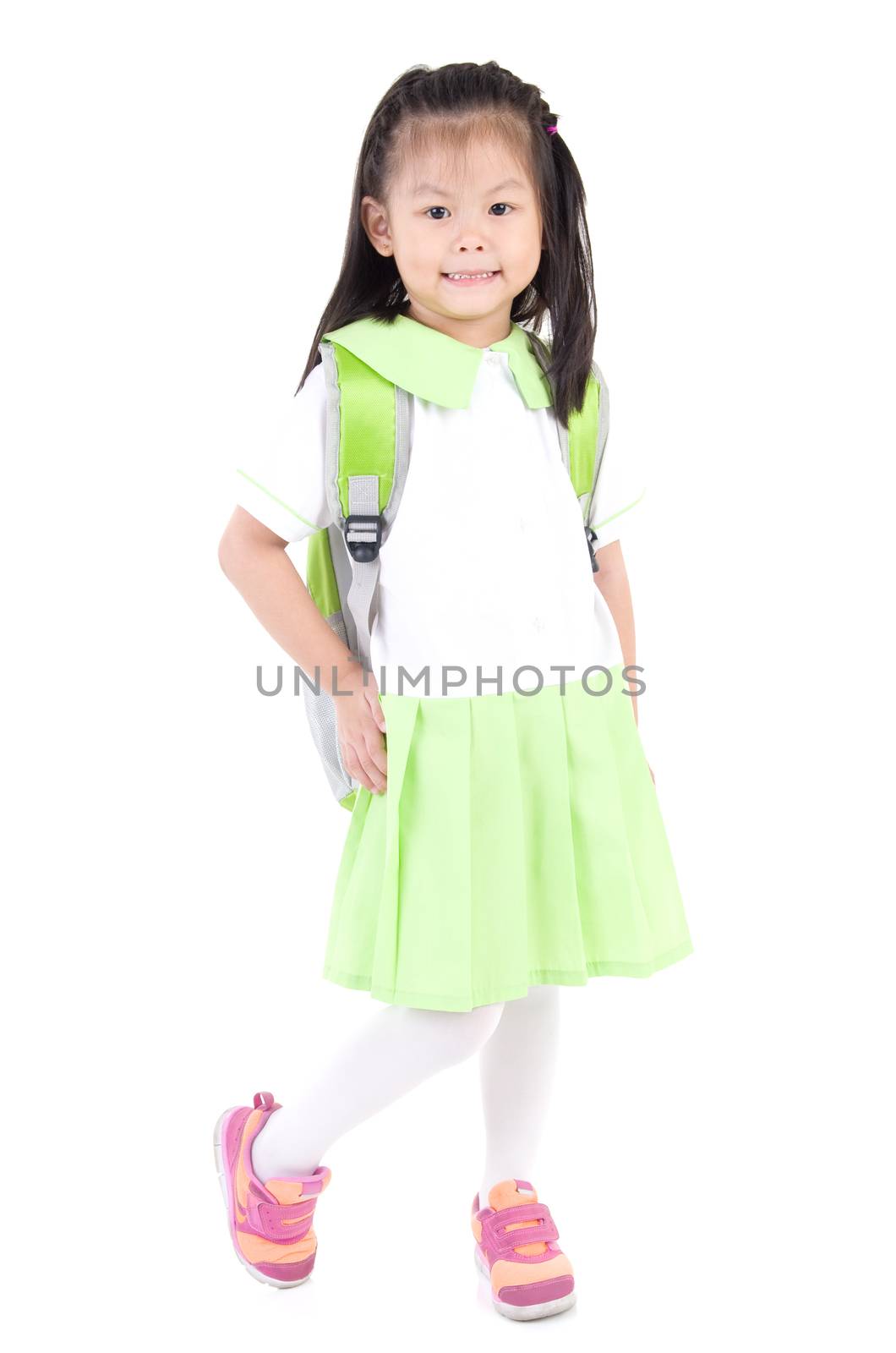 Asian primary student carried school bag isolated on white background