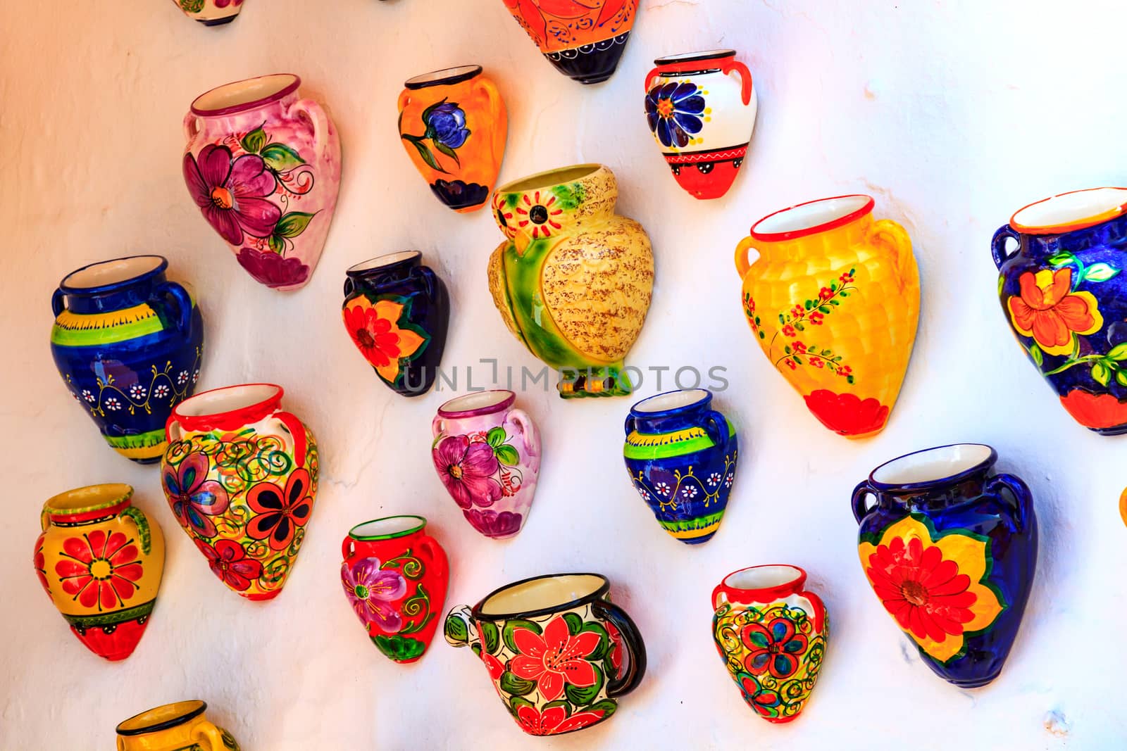 Colorful jugs on the wall