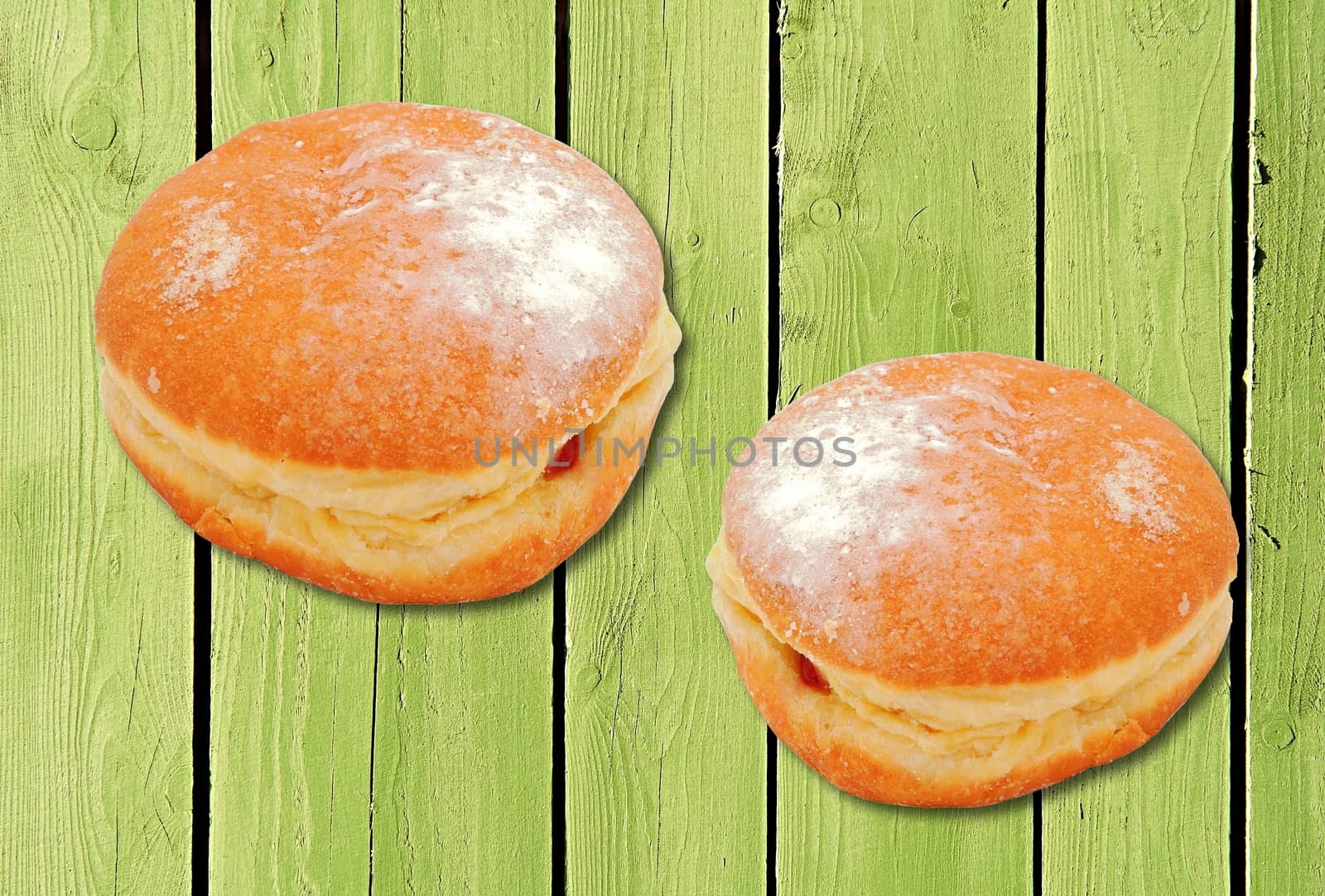 Two donuts with strawberry jam filling.