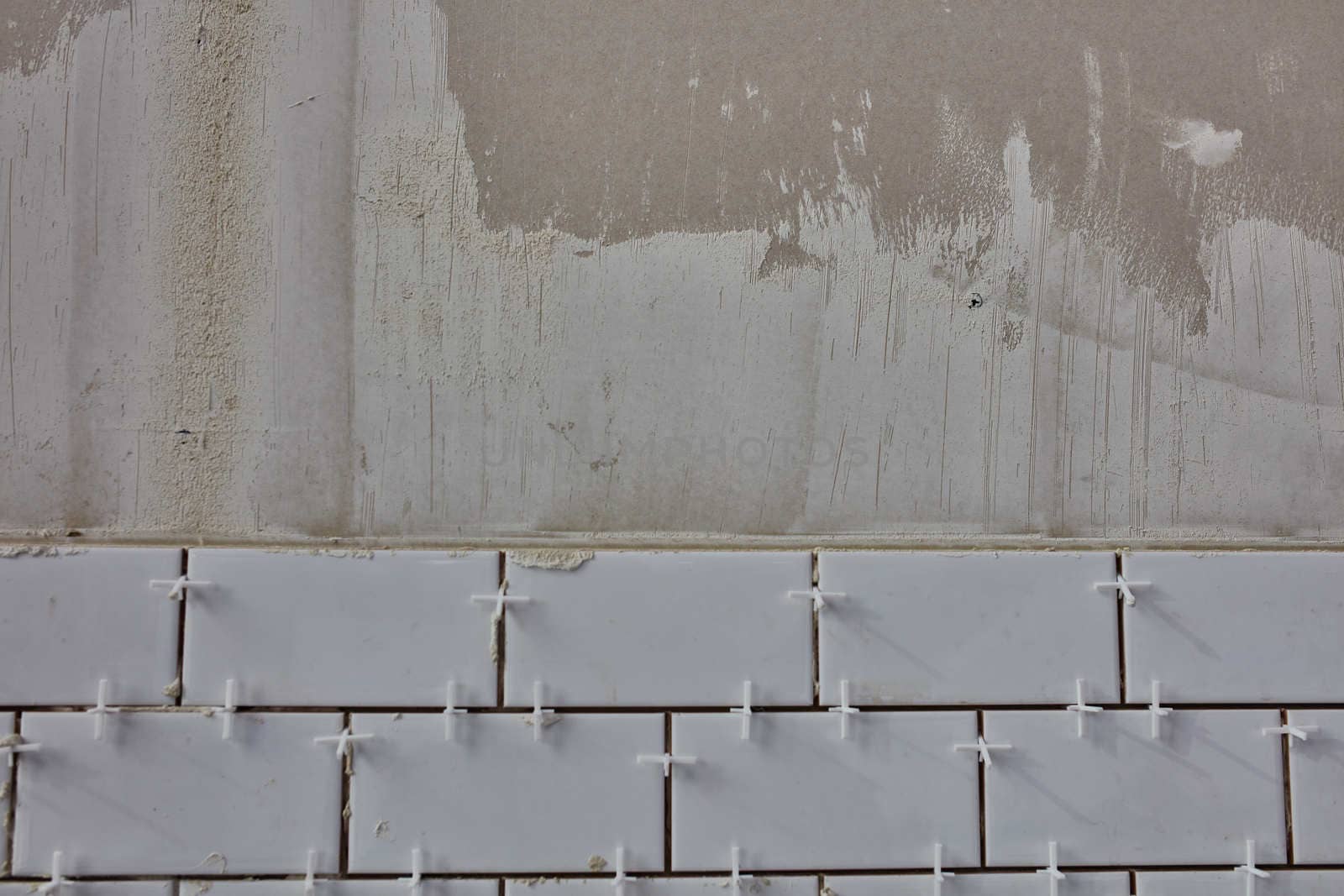 Tile lying