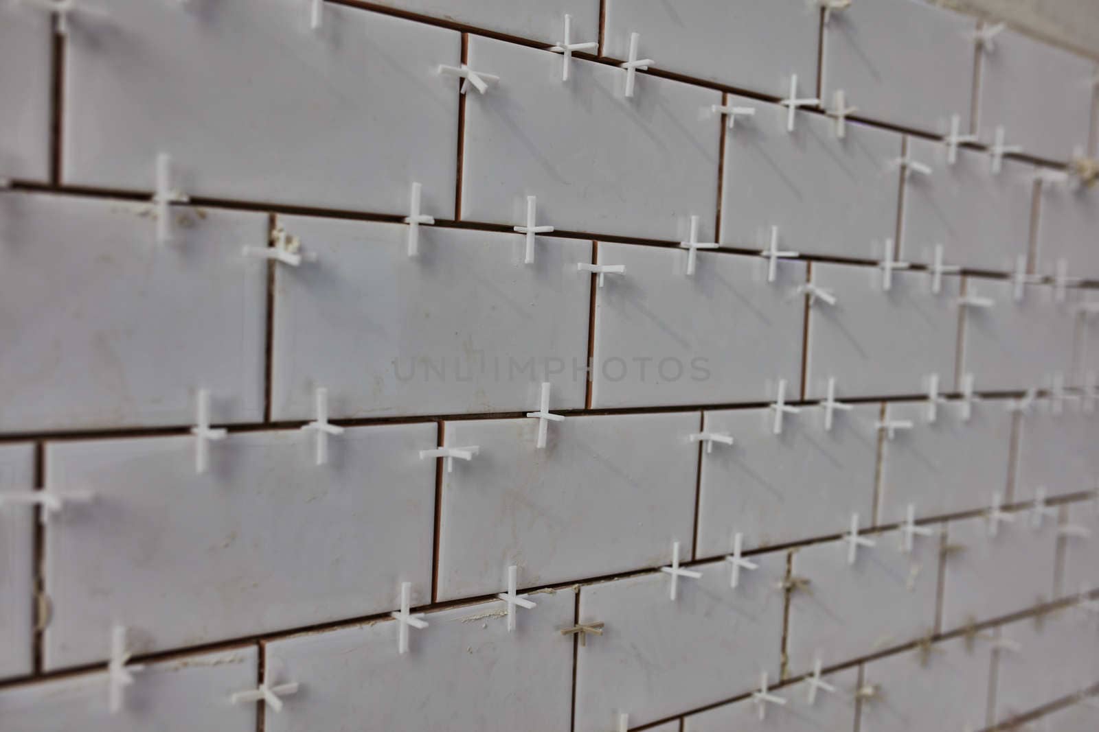 Tile lying
