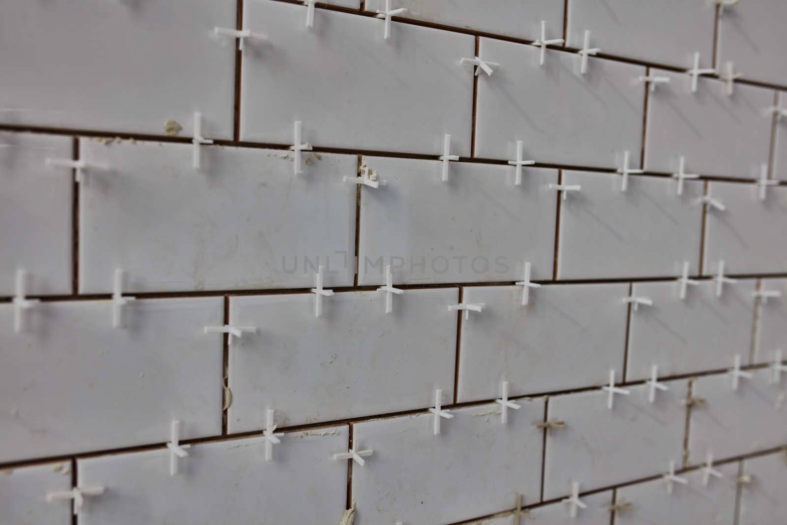 Tile lying