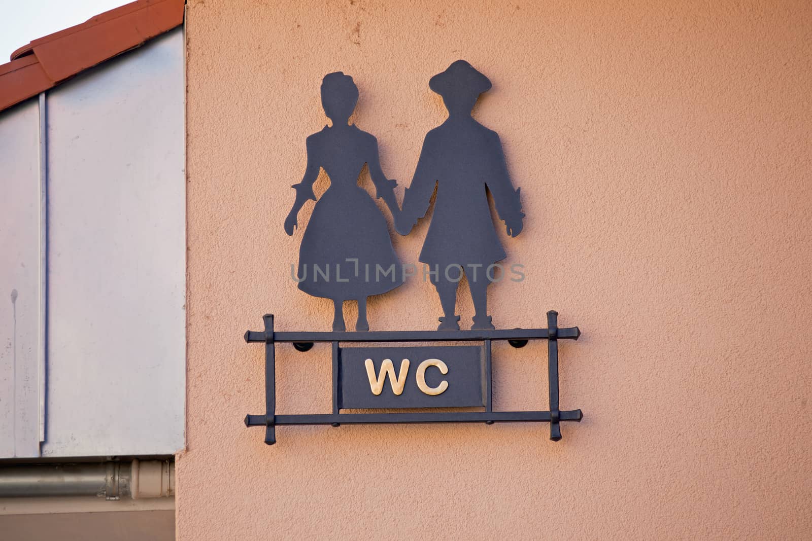 Sign WC with stylized man and woman
