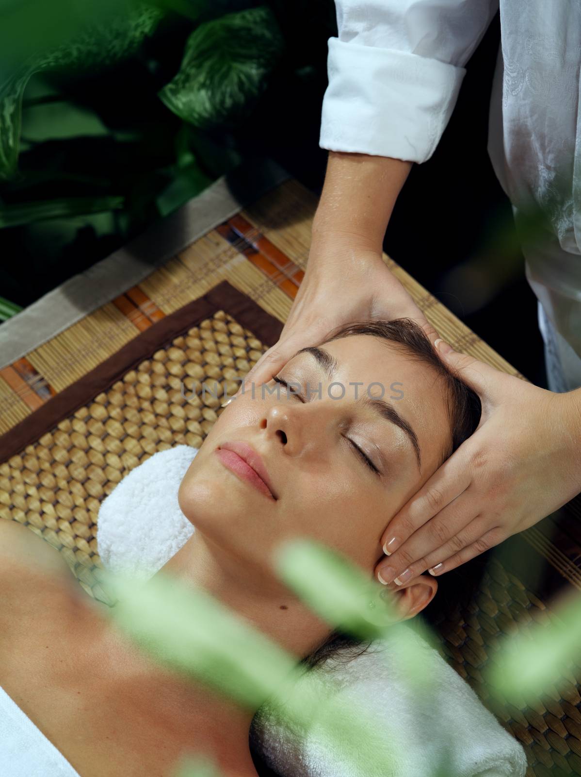 portrait of young beautiful woman in spa environment