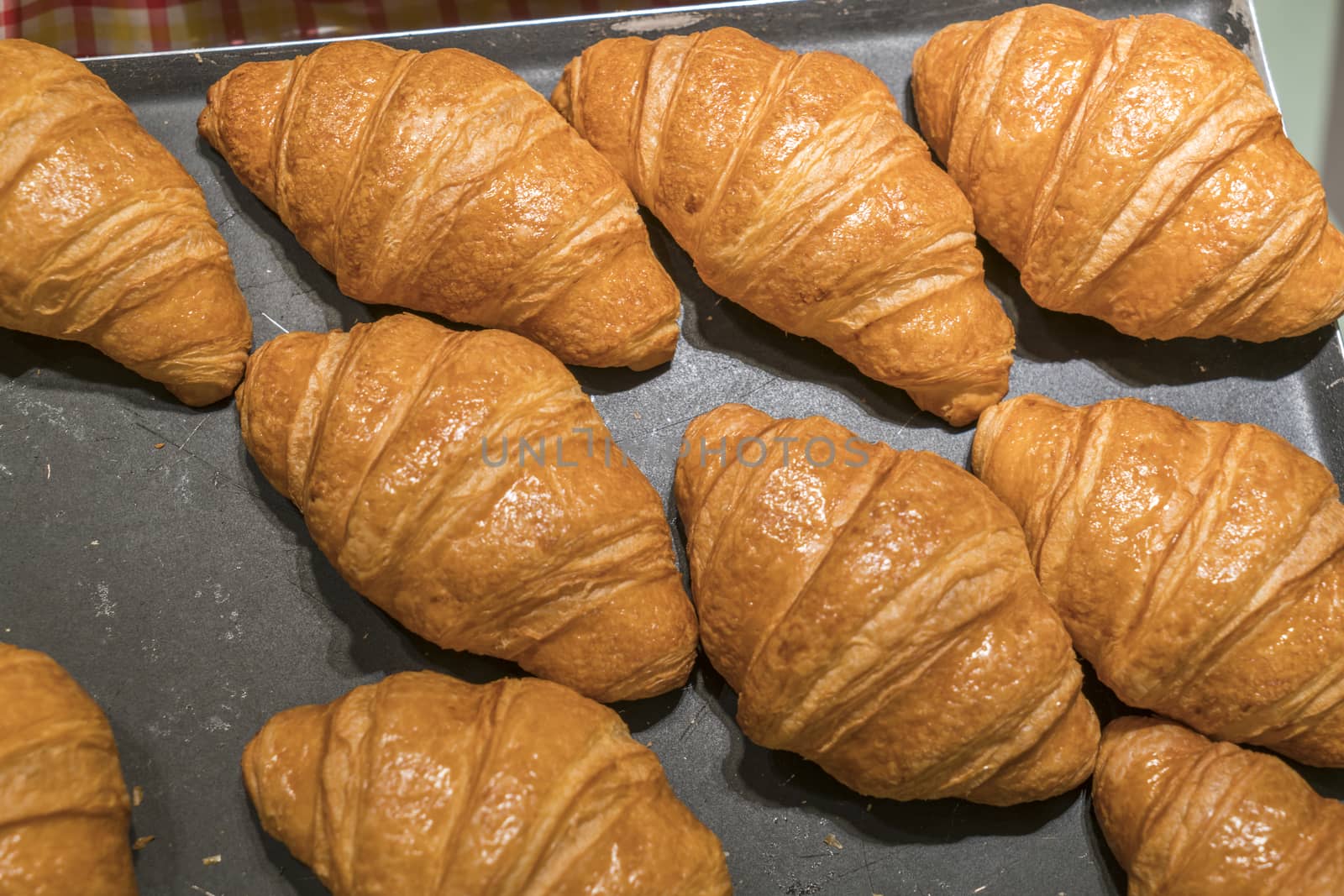 Croissants on a black background from above