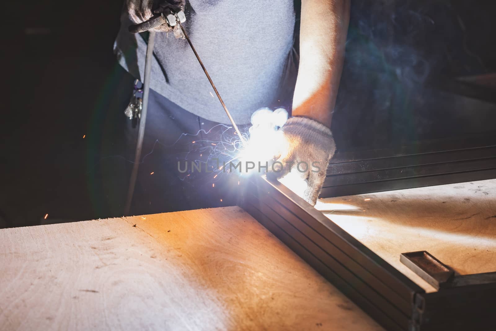 Men welder on a workshop by nopparats