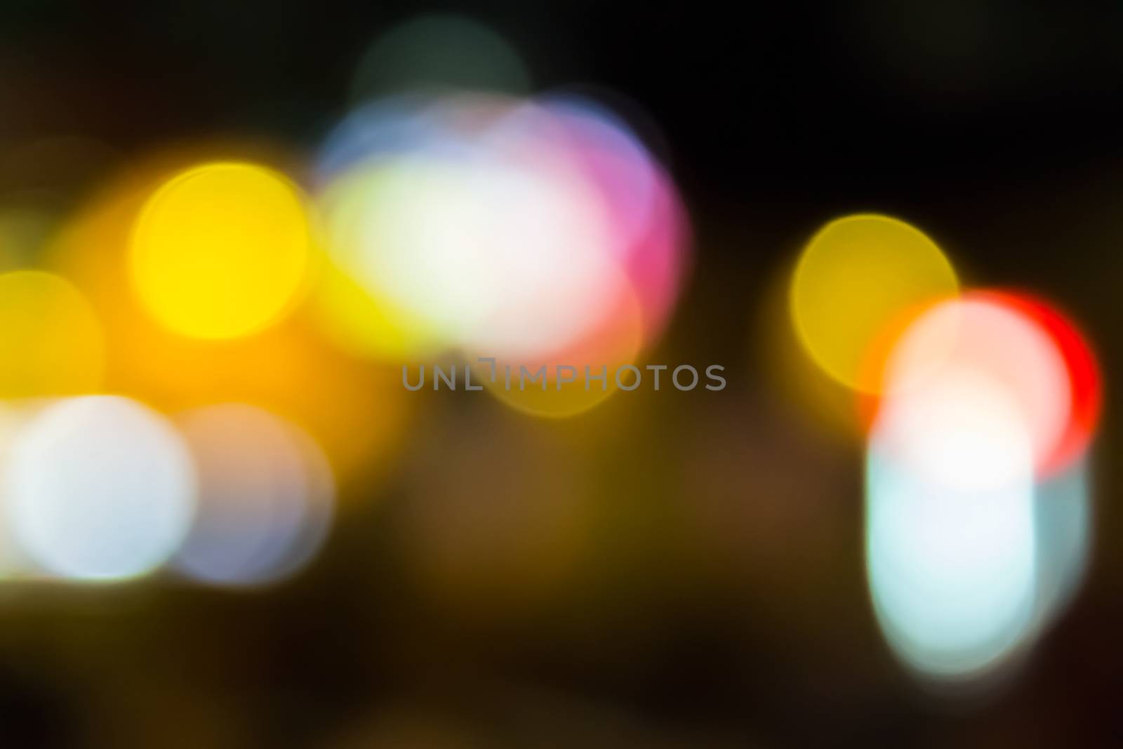 abstract background of blurred lights with bokeh effect by Pellinni