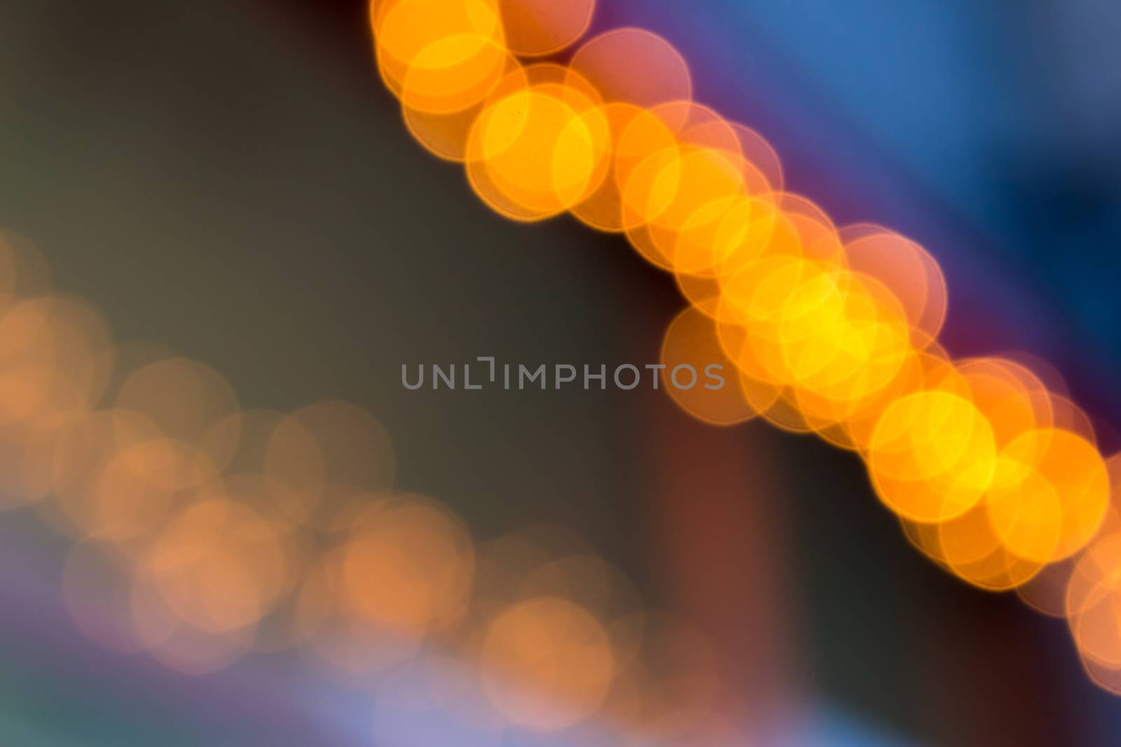 abstract background of blurred lights with bokeh effect by Pellinni