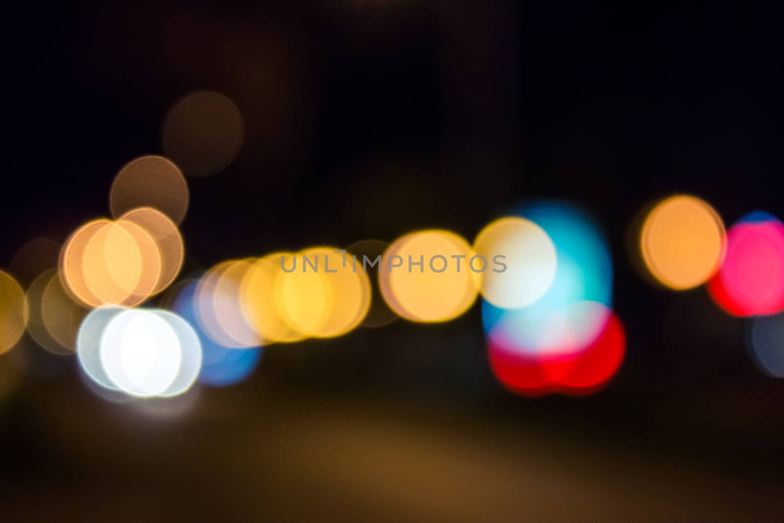abstract blur of red and blue street lights at night by Pellinni