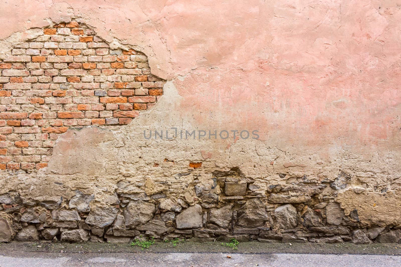 old cracked  wall with a stone base by Pellinni
