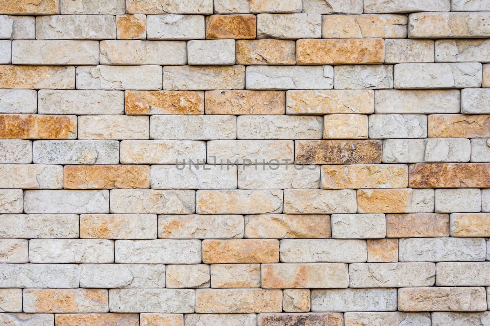 not smooth masonry brick wall of sand color
