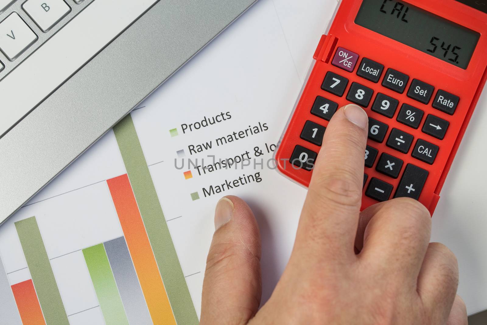 Accounting concept. Analyzing finance report with calculator by pixinoo