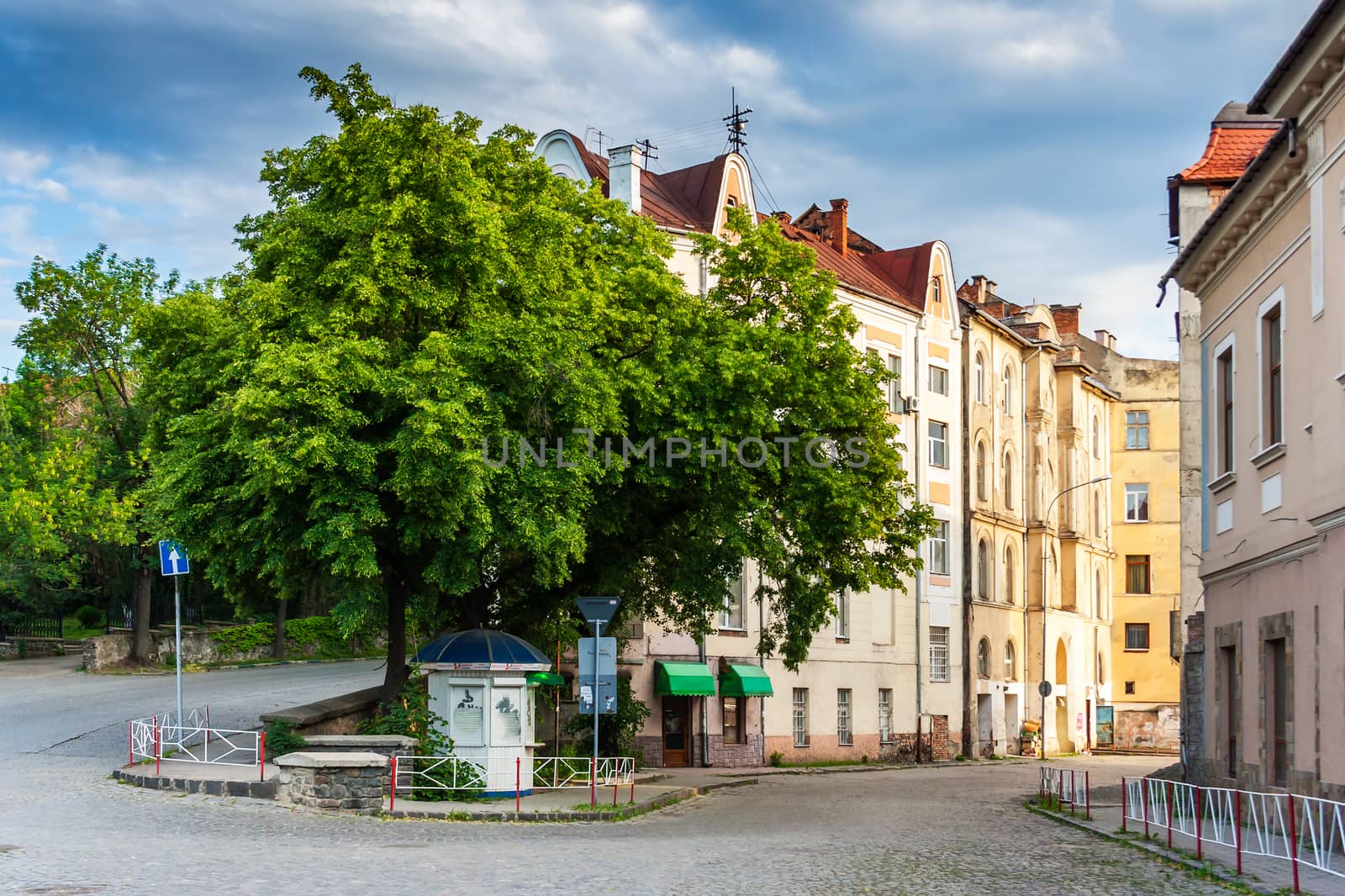 area of ​​the old city near the park is still asleep in the morning light, wrapped by cobbled street.