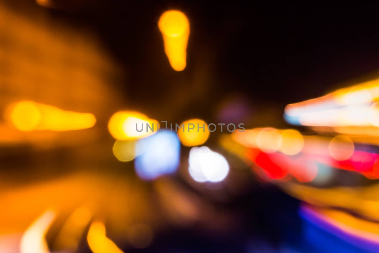abstract blur of night lighting in accelerated motion of approximation